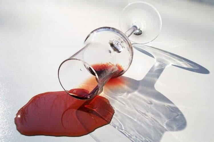 spilt wine to illustrate the drunken blur of an alcoholic